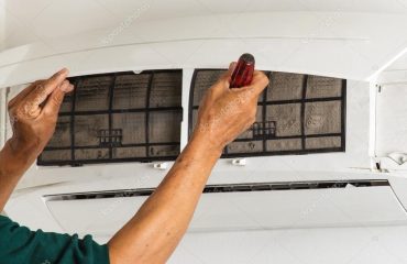 depositphotos_54517887-stock-photo-man-repair-air-conditioner